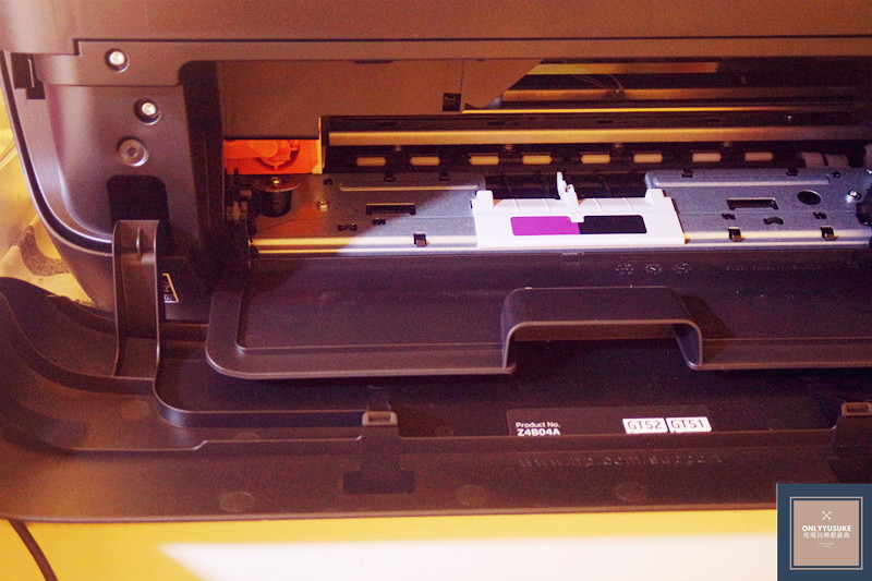 列印滑動架移到中央位置處再次按下電源鍵就能停止