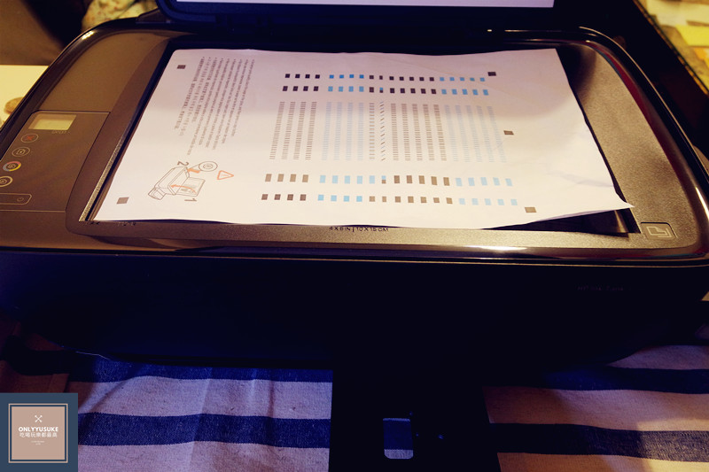 校正頁放在掃描器玻璃板上